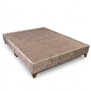 Base cama tapizada ambar de lujo con estructura robusta y textil de alta gama en Bogotá